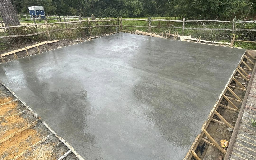 Freshly poured concrete driveway with smooth surface and clean edges
