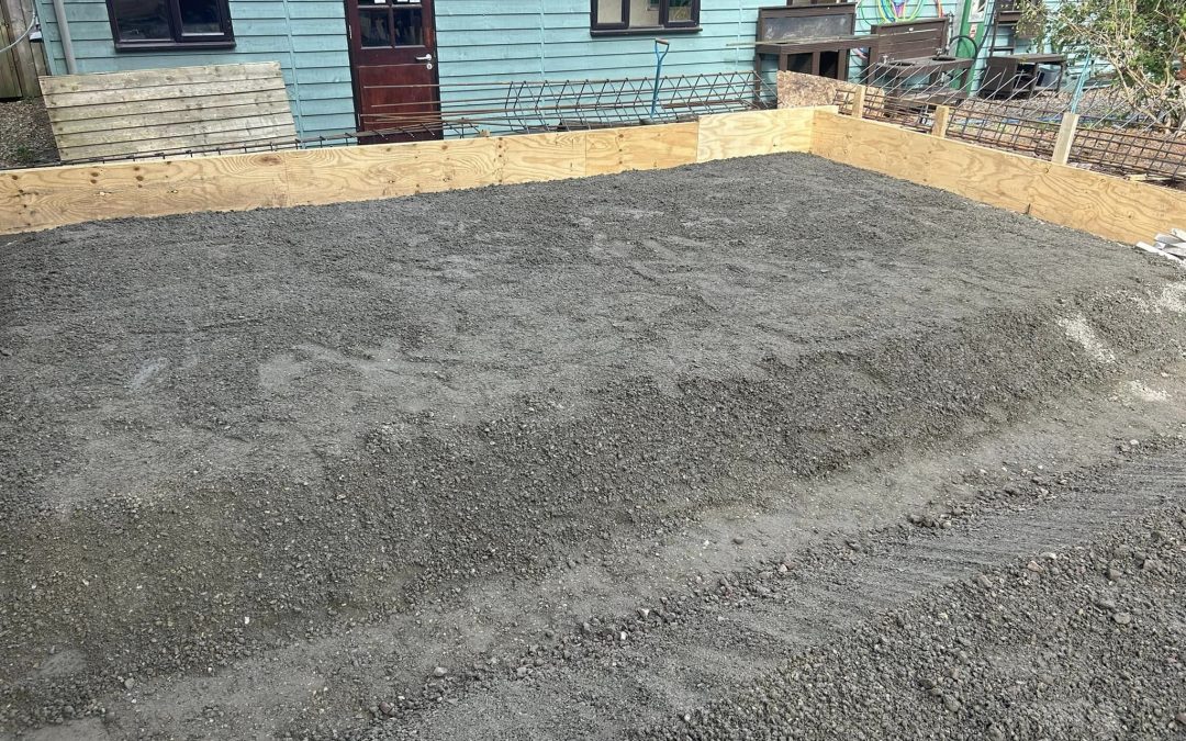 Freshly poured concrete driveway with smooth surface and precise edges